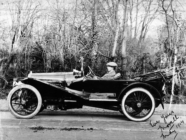 A man at the wheel of a Hispano-Suiza Alfonso XIII, 1914. Artist: Unknown