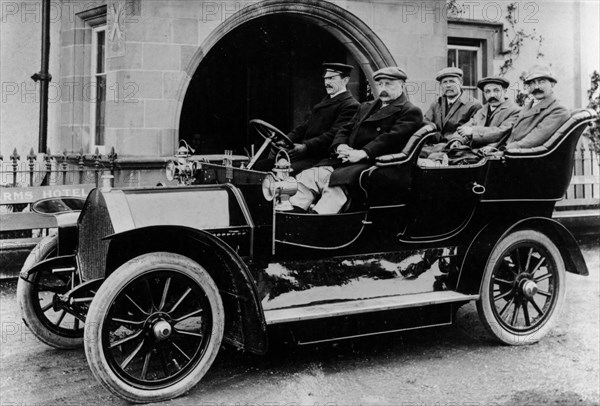 Chauffeur Charlie Keith at the wheel of a Humber, c1907. Artist: Unknown