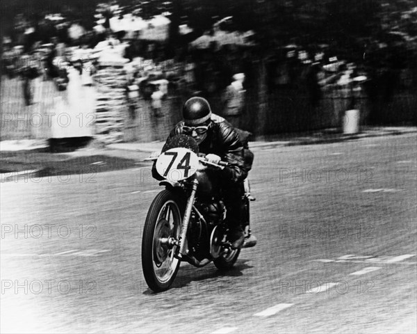 M Barrington on a Moto Guzzi bike, Isle of Man TT, 1949. Artist: Unknown