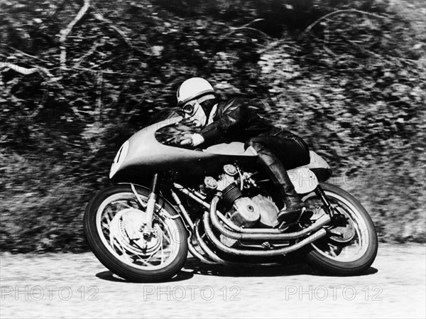 John Surtees on an MV Agusta, Waterworks Corner, Isle of Man Senior TT, 1956. Artist: Unknown