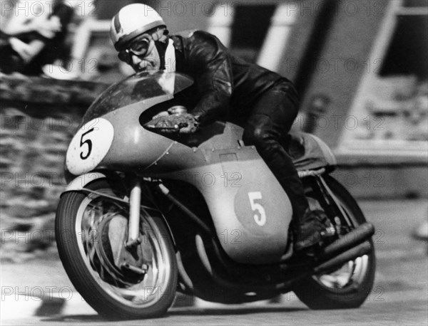 John Surtees winning the Isle of Man Junior TT, on an MV Agusta, 1959. Artist: Unknown