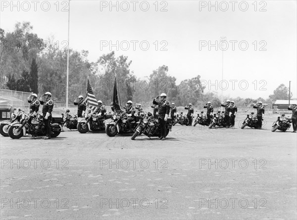 A police patrol with their Harley-Davidsons, America. Artist: Unknown