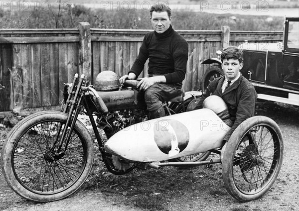 FW Dixon on a Harley-Davidson, with a passenger in the sidecar, 1921. Artist: Unknown