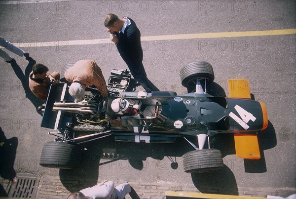 John Surtees in his BRM at the British Grand Prix, Silverstone, Northamptonshire, 1969. Artist: Unknown