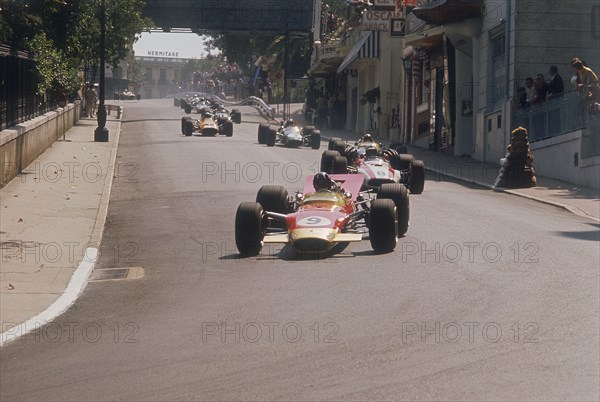 Graham Hill's Lotus leading John Surtees' Honda, Monaco Grand Prix, 1968. Artist: Unknown