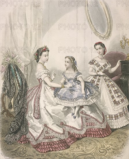 Two women and a small girl wearing the latest indoor fashions, c1860. Artist: Millia Lacouriere