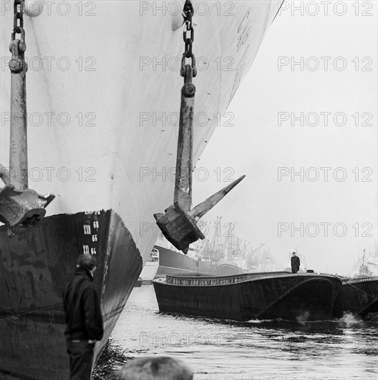 Ships in the docks on the Thames, London, July 1965