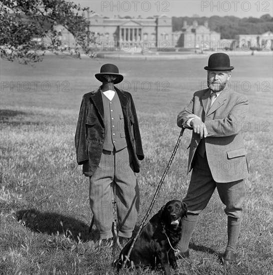 Man in breeches with a dog and a mannequin, Holkham Hall, Norfolk, 1978-1981