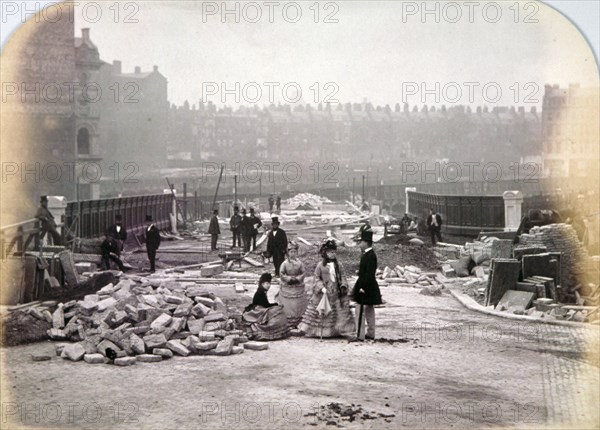 View of figures on Holborn Viaduct during its construction, City of London, 1870. Artist: Henry Dixon