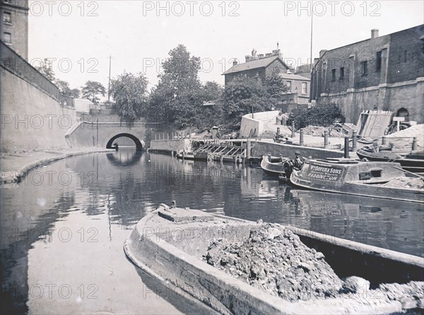 Unloading on the Grand Union Canal, London, c1905. Artist: Unknown