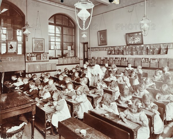 Writing lesson, Hugh Myddelton School, Finsbury, London, 1906. Artist: Unknown.