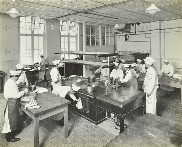 Male cookery students at work in the kitchen, Westminster Technical Institute, London, 1910. Artist: Unknown.