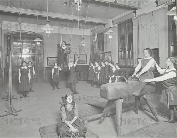Gymnastics lesson, Laxon Street Evening Institute for Women, London, 1914. Artist: Unknown.