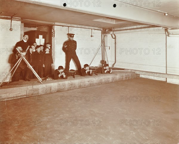 Rifle shooting lesson, Jews' Free School, Stepney, London, 1908. Artist: Unknown.