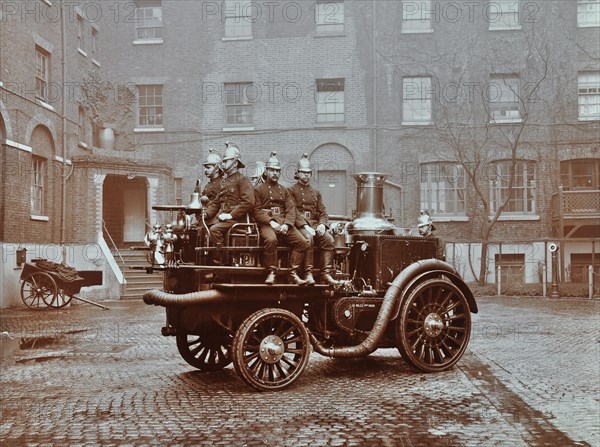 Firemen aboard a motor steamer, London Fire Brigade Headquarters, London, 1909. Artist: Unknown.