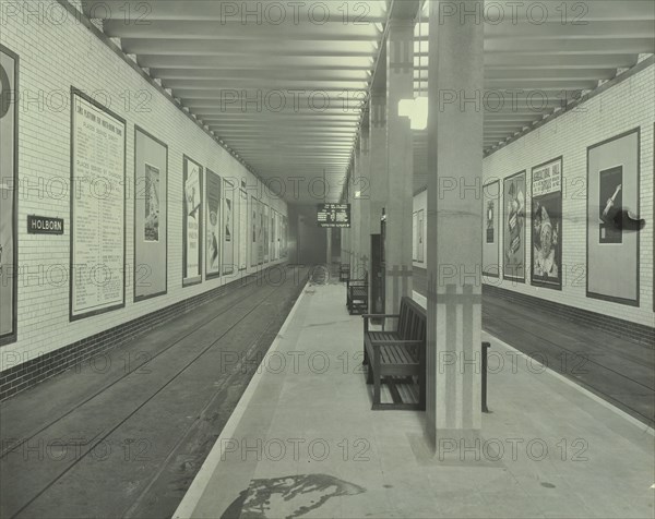 Platform with advertising posters, Holborn Underground Tram Station, London, 1931. Artist: Unknown.