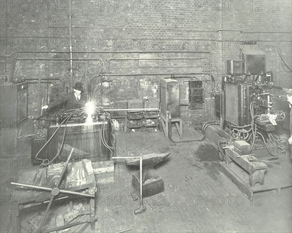 Men welding, Charlton Central Repair Depot, London, 1932. Artist: Unknown.