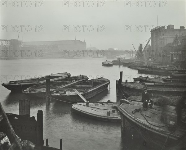 Barges moored at Bankside wharves looking downstream, London, 1913. Artist: Unknown.