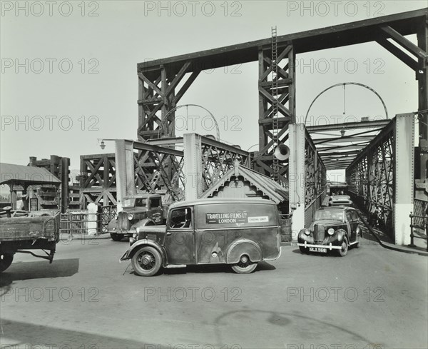 Traffic driving on to the Woolwich Ferry, London, 1945. Artist: Unknown.