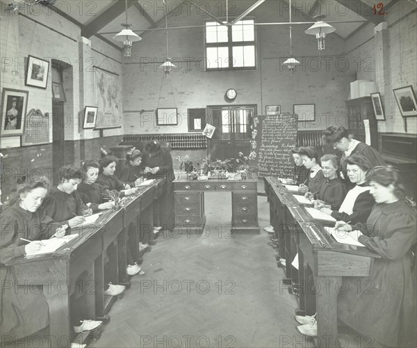 Language lesson on daffodils at Oak Lodge School for Deaf Girls, London, 1908. Artist: Unknown.