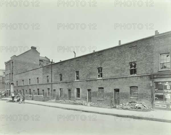 Row of derelict houses, Hackney, London, August 1937. Artist: Unknown.