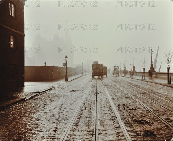 Tramlines and vehicles on the Albert Embankment, Lambeth, London, 1909. Artist: Unknown.