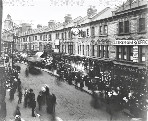 Busy street scene, St John's Road, Clapham Junction, London, 1912. Artist: Unknown.