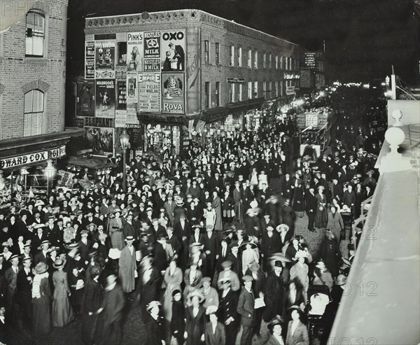 Crowds of shoppers in Rye Lane at night, Peckham, London, 1913. Artist: Unknown.