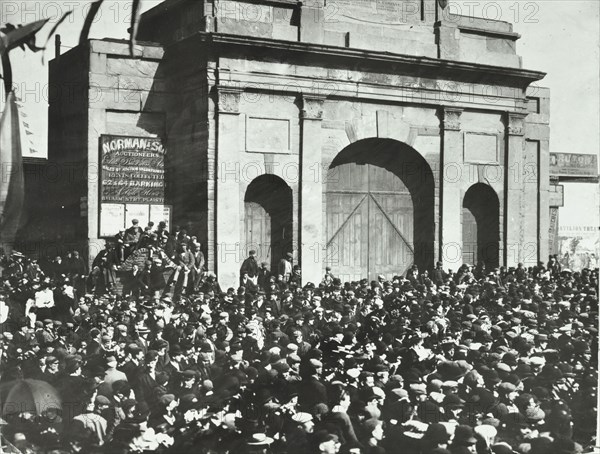 Crowd outside the closed East India Dock Gates, Poplar, London, 1897. Artist: Unknown.