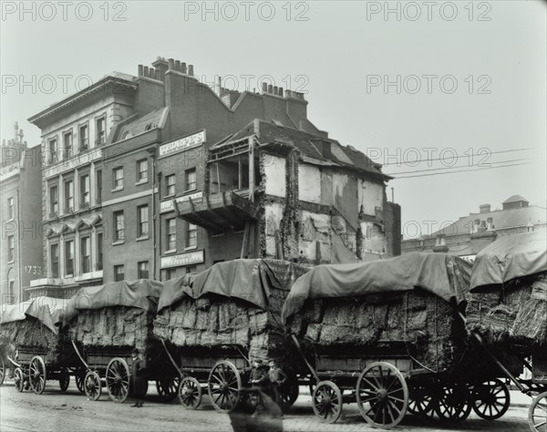 Hay wagons, Whitechapel High Street, London, 1903. Artist: Unknown.