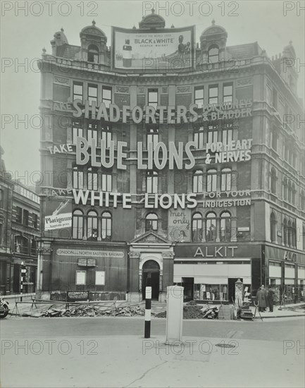 Advertisements at Cambridge Circus, Westminster, London, 1945. Artist: Unknown.