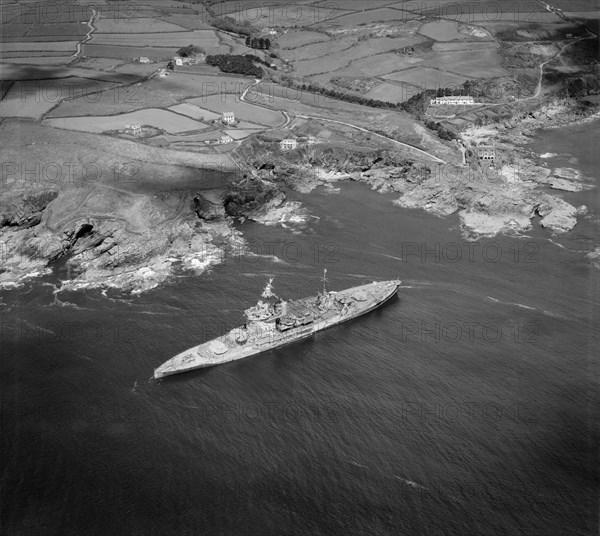 HMS 'Warspite' aground in Prussia Cove, Cornwall, May 1947.   Artist