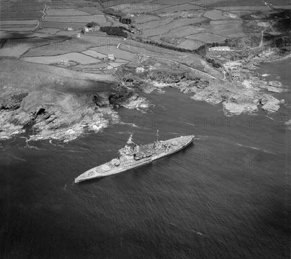 HMS 'Warspite' aground in Prussia Cove, Cornwall, May 1947. Artist
