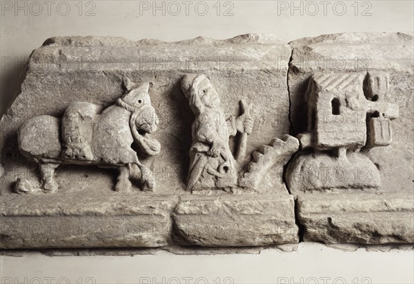 Stone carving depicting milling, museum of Rievaulx Abbey, North Yorkshire, c2013