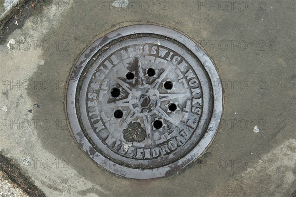 Coal hole plate outside 48 Arbour Square, Stepney, Tower Hamlets, London, 2010