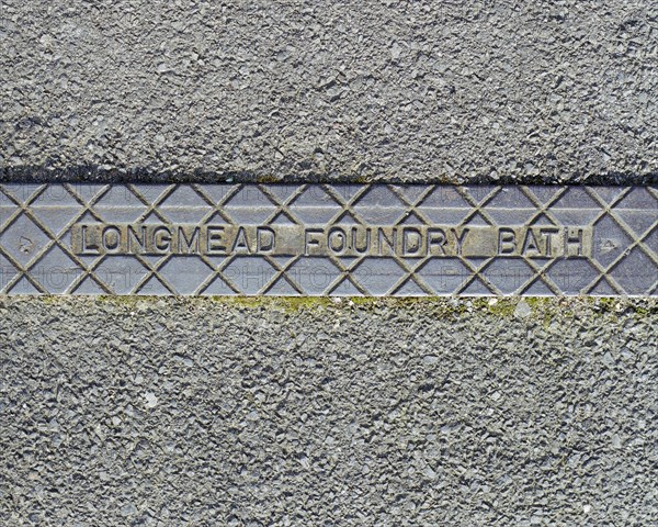 Pavement rainwater gully cover plate made by Longmead Foundry, Bath, Swindon, Wiltshire, 2006