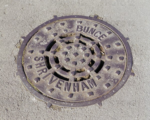 Drain cover plate made by Bunce of Shrivenham, Swindon, Wiltshire, 2006