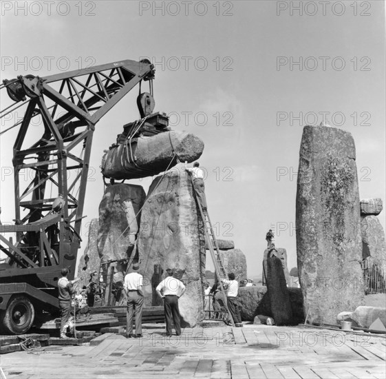 Re-erection of Trilithon lintel, Stonehenge, Wiltshire, 1958