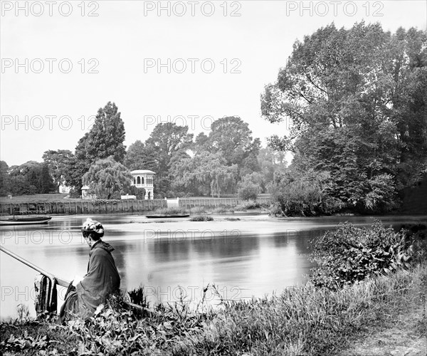 Woman waiting for the Rails Head Ferry on the River Thames, Isleworth, London, c1860-c1899