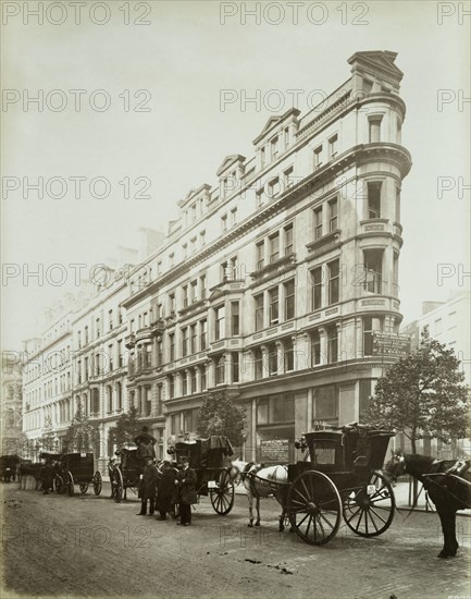 Horse-drawn cabs on Northumberland Avenue, Westminster, London, 1885