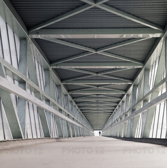 Interior of a covered footbridge at the London Docks, 1965