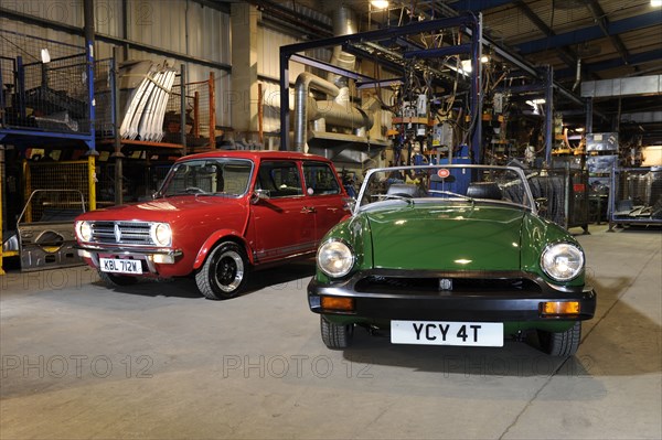 Austin Mini 1275 GT 1980 and MG Midget 1979. Artist: Simon Clay.