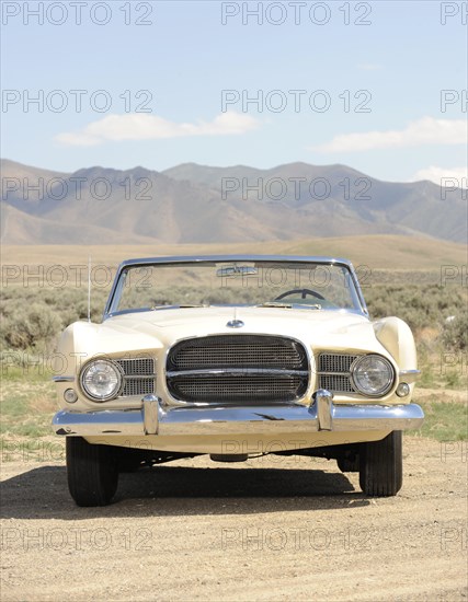 Dual Ghia 1957. Artist: Simon Clay.