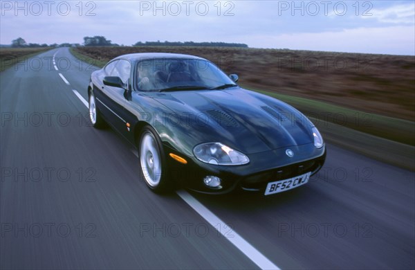 2002 Jaguar XKR coupe. Artist: Unknown.