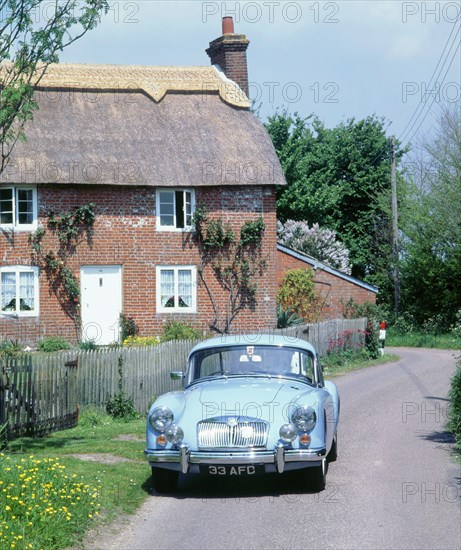 1959 MG A Twin Cam Coupe. Artist: Unknown.