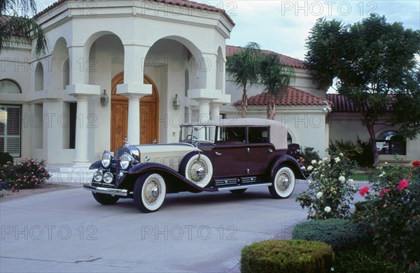 1932 Cadillac v16 convertible. Artist: Unknown.