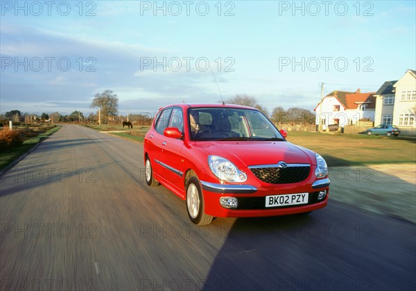 2002 Daihatsu Sirion 1.3 SL. Artist: Unknown.