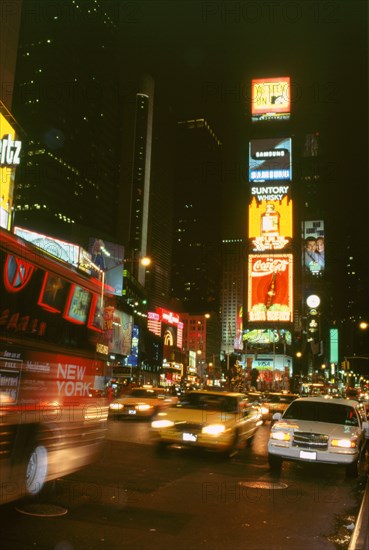 New York city street at night. Artist: Unknown.