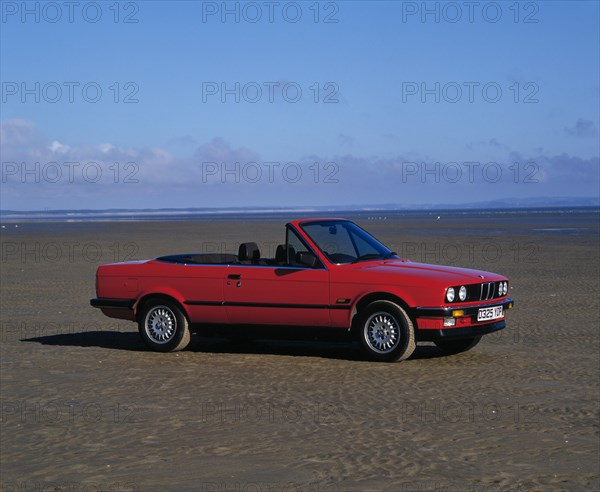1987 BMW 325i convertible. Artist: Unknown.