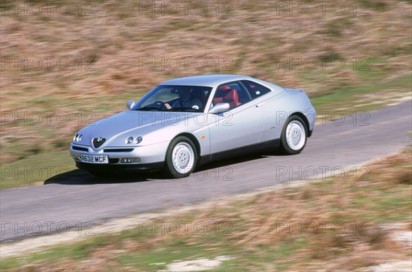 1998 Alfa Romeo GTV twin spark. Artist: Unknown.